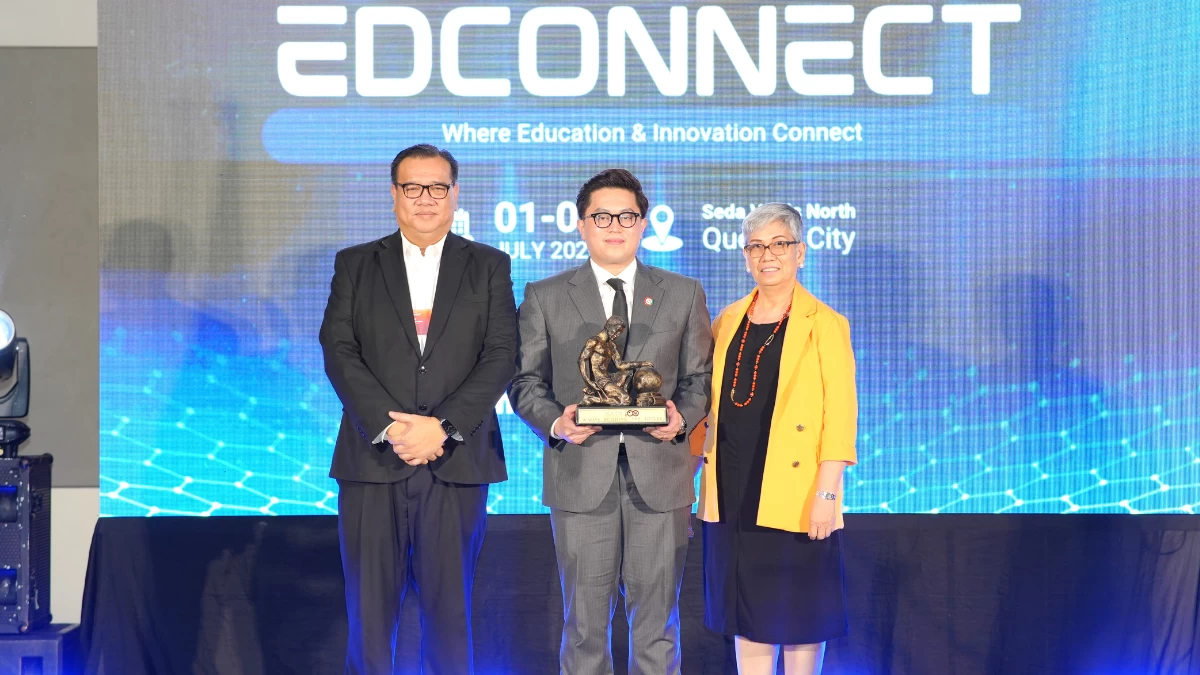 (From left) Mapúa University president and CEO Dr. Dodjie S. Maestrecampo, C&E Adaptive Learning Solutions chief executive officer John Emyl Eugenio, and Mapúa University executive vice president for Academic Affairs Dr. Lilibeth D. Sabino take part in the ceremonial handover of Mapúa University's iconic Builder statue during EdConnect 2026, symbolizing the shared commitment of both organizations to educational advancement. (Photos: Mapua)
