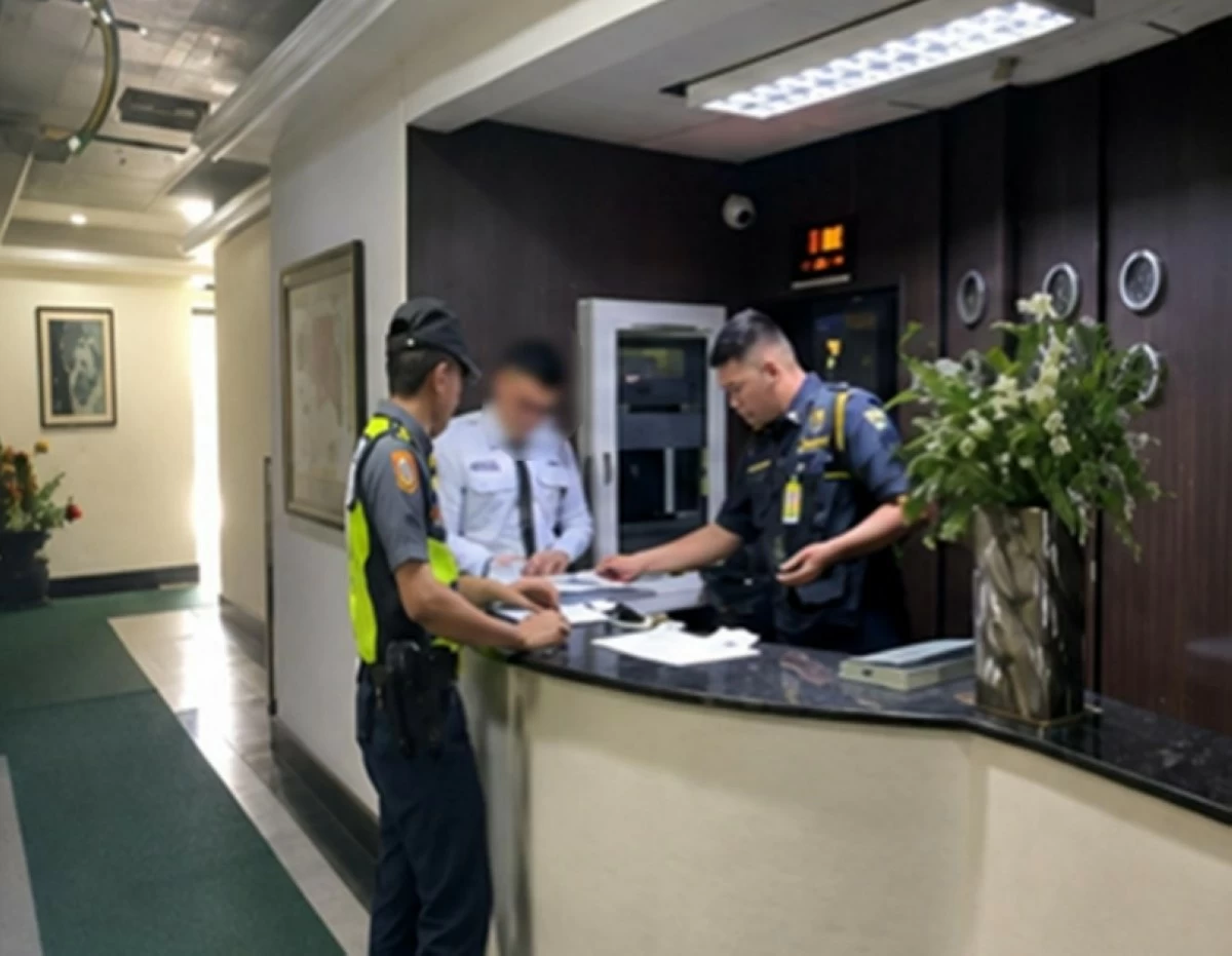 Muntinlupa police inspect an office in Barangay Ayala Alabang on Aug. 10 after a bomb threat. (Photo from Muntinlupa police / SPD)