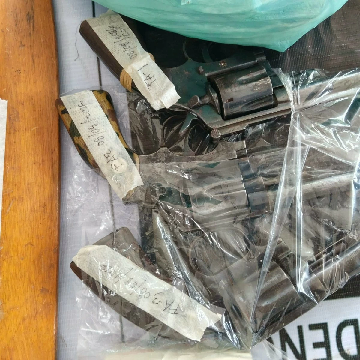 The three .38 revolvers that were recovered from the house of a man tagged as a suspect in the beheading of a woman in Talisay City, Cebu.