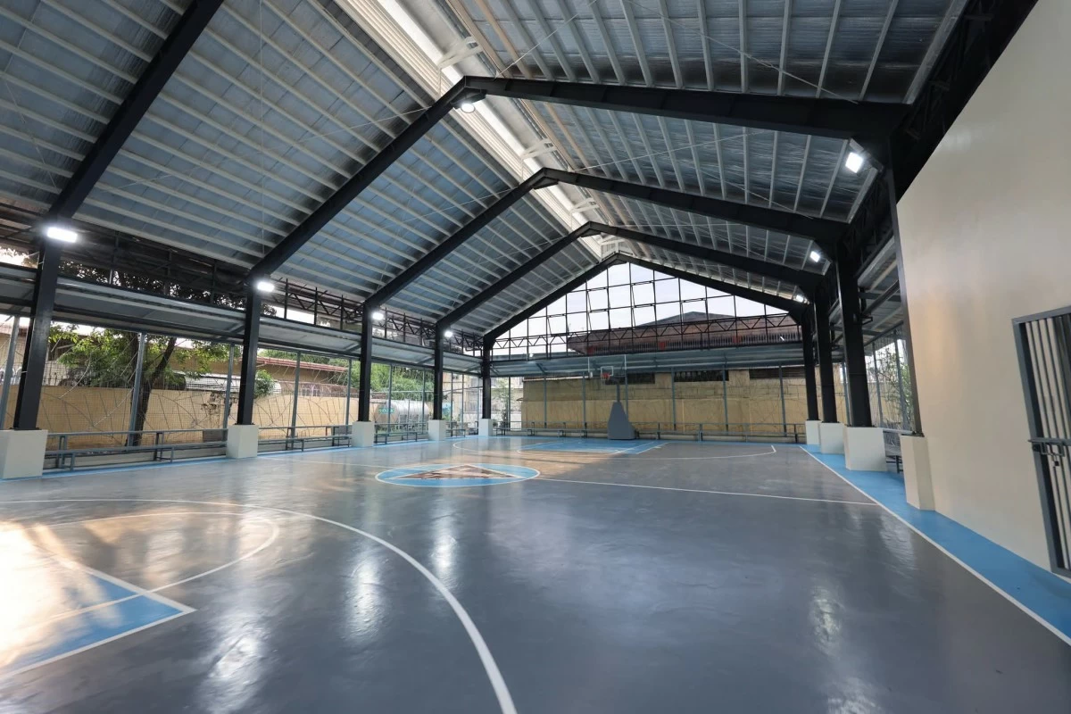 A covered basketball court with a detention basin underneath was opened in Gloria 2 Subdivision in Barangay Tandang Sora to help address flooding in the community.