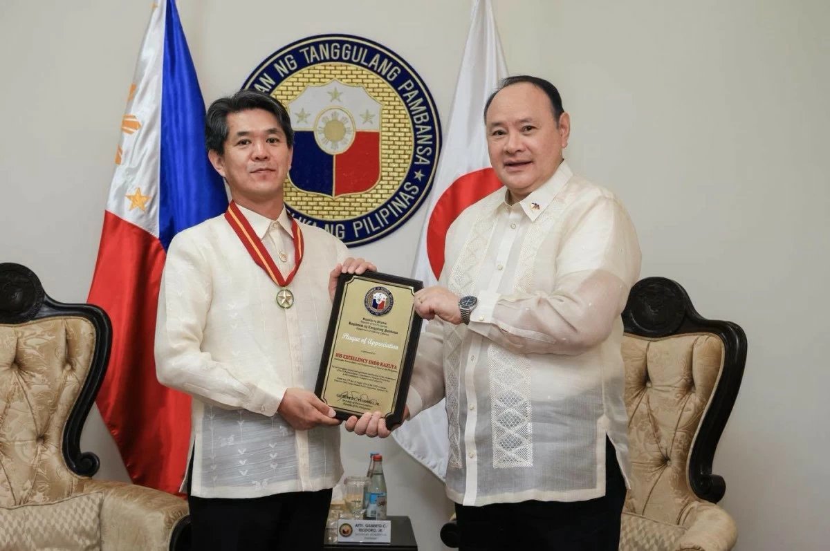 Department of National Defense (DND) Sec. Gilberto Teodoro Jr. (right) presents a plaque of appreciation to outgoing Japanese ambassador to the Philippines Endo Kazuya during his farewell call at the DND Building, Camp Aguinaldo in Quezon City on Aug. 11, 2026. (Photo: DND)