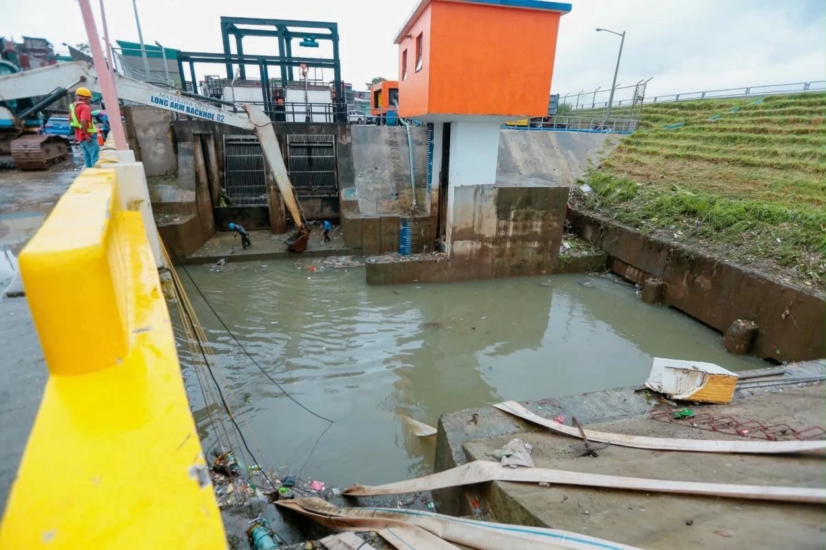 The Marikina City government conducts clearing and flushing operations after flooding affected several parts of the city due to the southwest monsoon (habagat). (Photos from Marikina LGU)