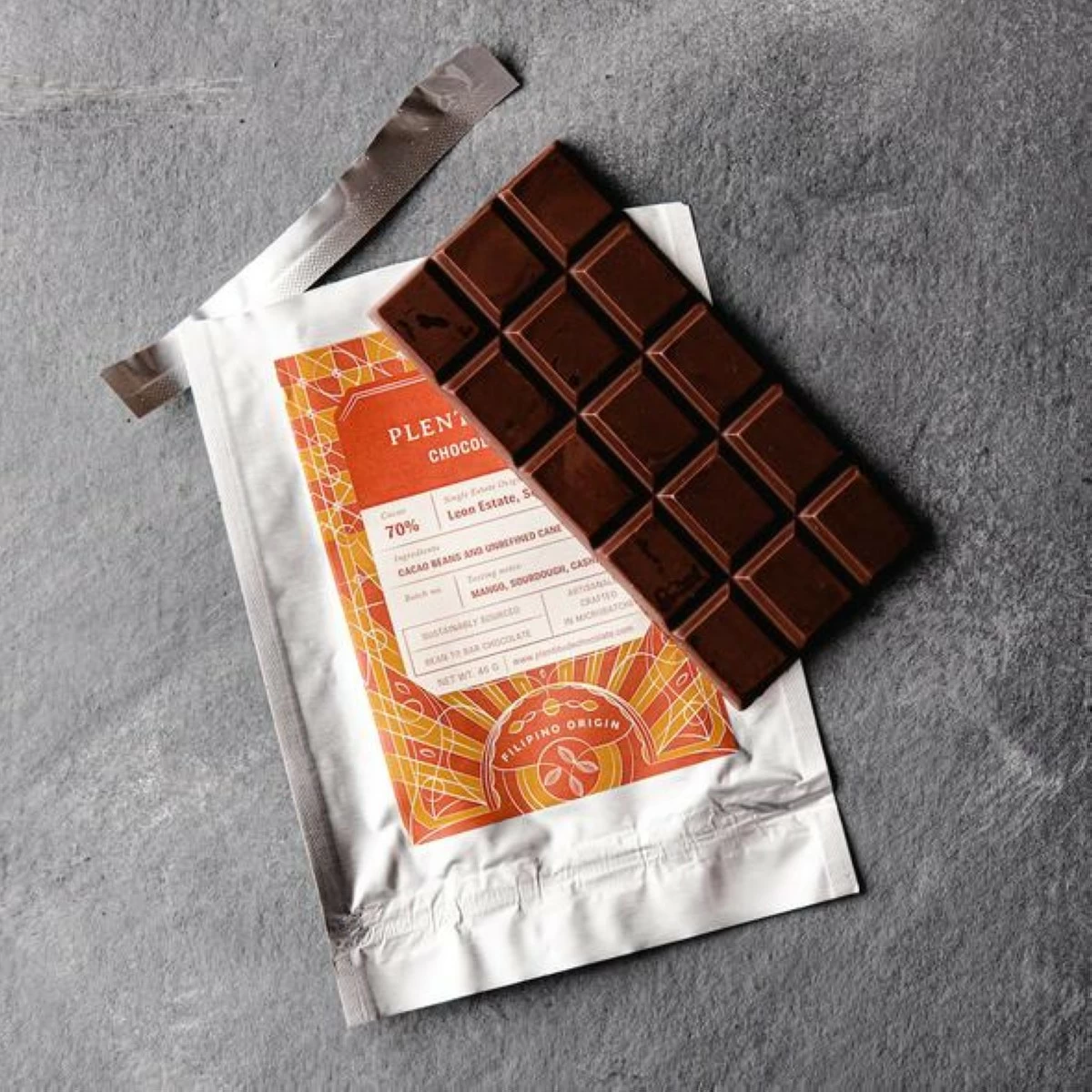 SINGLE ESTATE — Plentitude’s single origin chocolate bars bear the name of the farm and province the beans originated from, as well as tasting notes.  