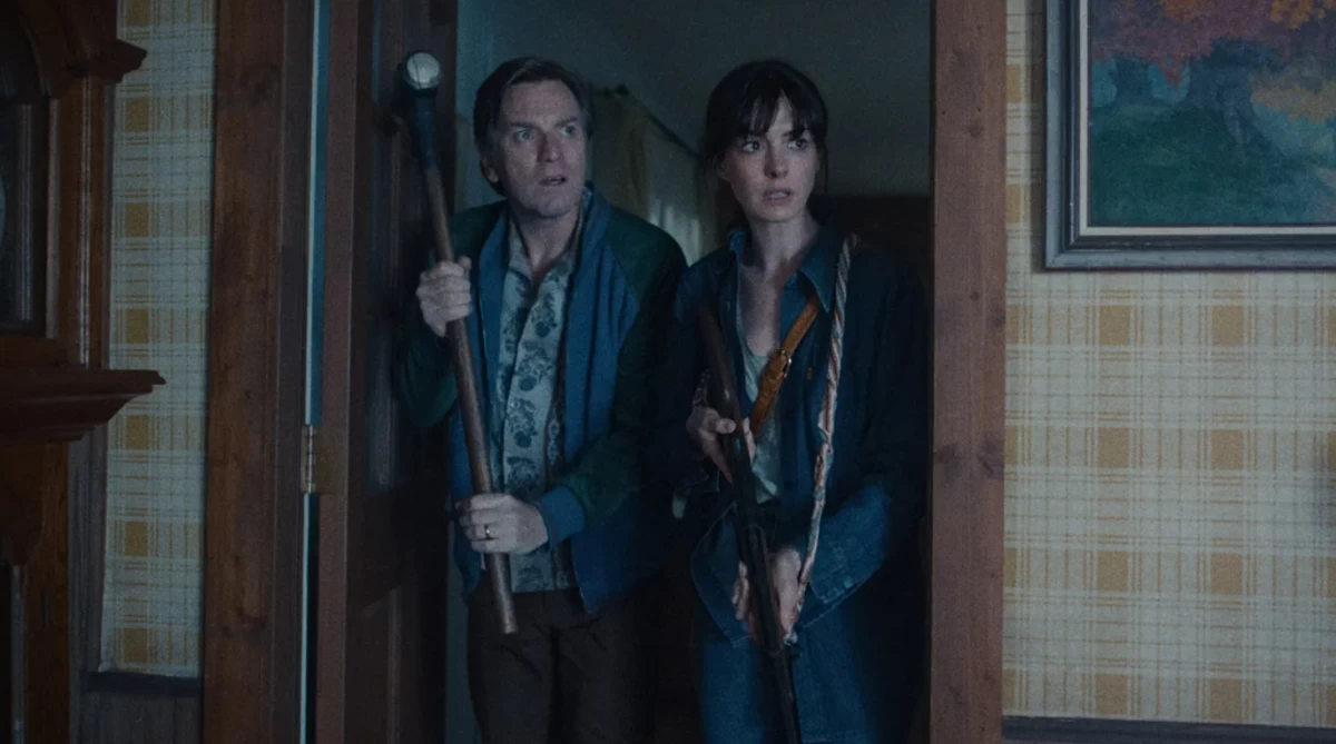 SURVIVING TOGETHER Ewan McGregor and Anne Hathaway lead the cast of 'The End of Oak Street.' (Photos: Warner Brothers)