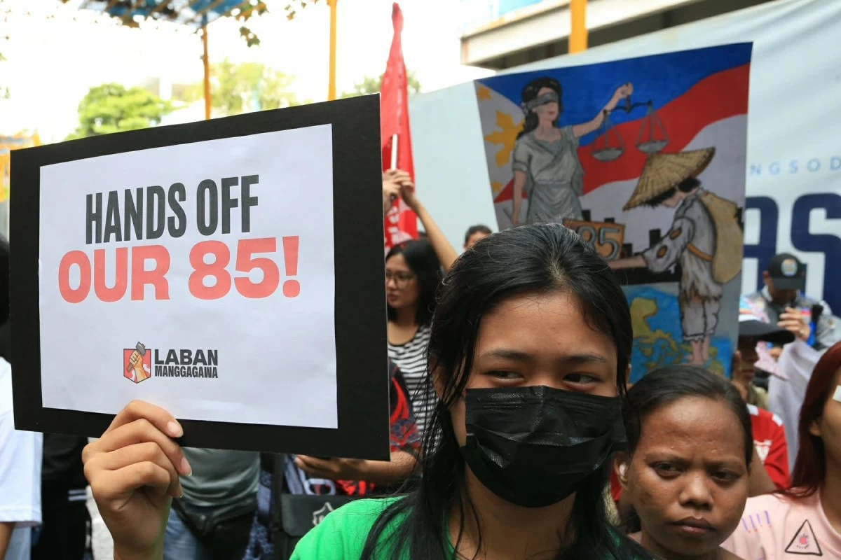 Labor groups and workers’ coalitions staged a protest outside the Pasig Regional Trial Court on Monday, Aug. 3, condemning the temporary restraining order that suspended the P85 minimum wage hike in Metro Manila. (Photo by Santi San Juan)