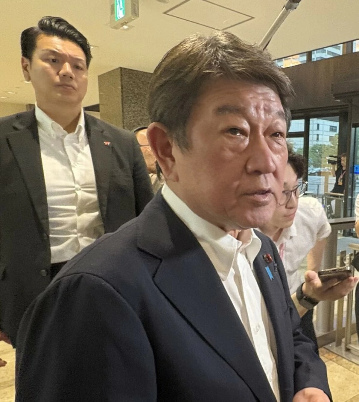 Japanese Foreign Minister Toshimitsu Motegi speaks to reporters on Thursday after lodging a protest with Russian Ambassador to Japan Nikolay Nozdrev over Russian President Vladimir Putin's visit to one of the four northwestern Pacific islands at the center of the long-standing territorial dispute between Tokyo and Moscow.