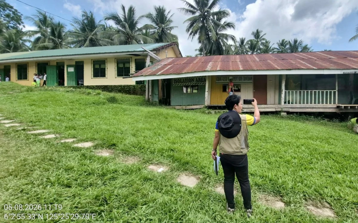 A personnel of Office of Civil Defense-12 conducts Post-Disaster Needs Assessment at a school in Malaptan ( OCD 12 Photo)  


