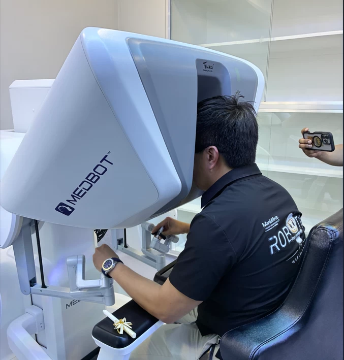 EDDIE can be controlled by the surgeon through a console.