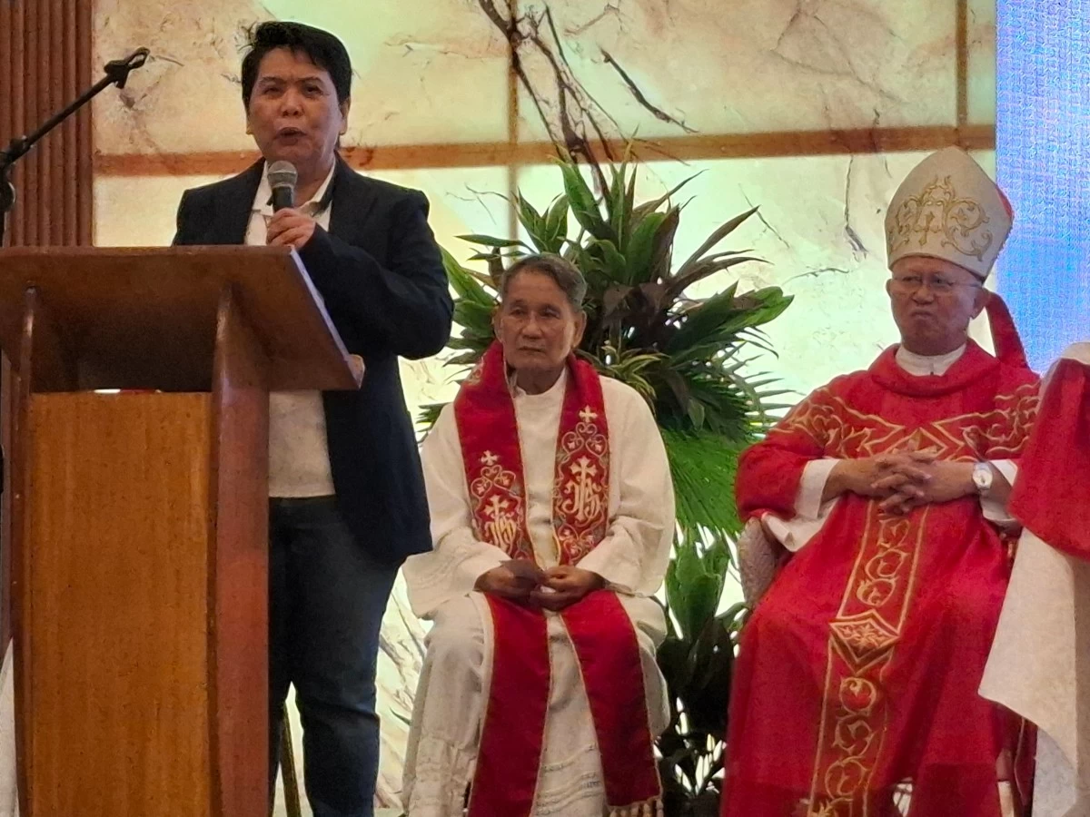 Businesswoman Fe Barino speaks during a Mass celebrated by Archbishop Emeritus Jose Palma marking the 10th anniversary of drug recovery program Surrender to God.(Photo by Calvin Cordova)