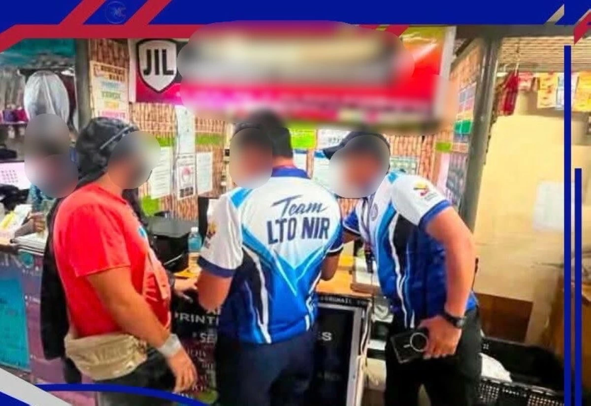 Two persons were arrested by authorities in an entrapment operation against alleged fixers reportedly involved in the issuance and printing of fake driver’s licenses in a shop at the downtown area in Bacolod City on Friday, August 14. (LTO-NIR) 
