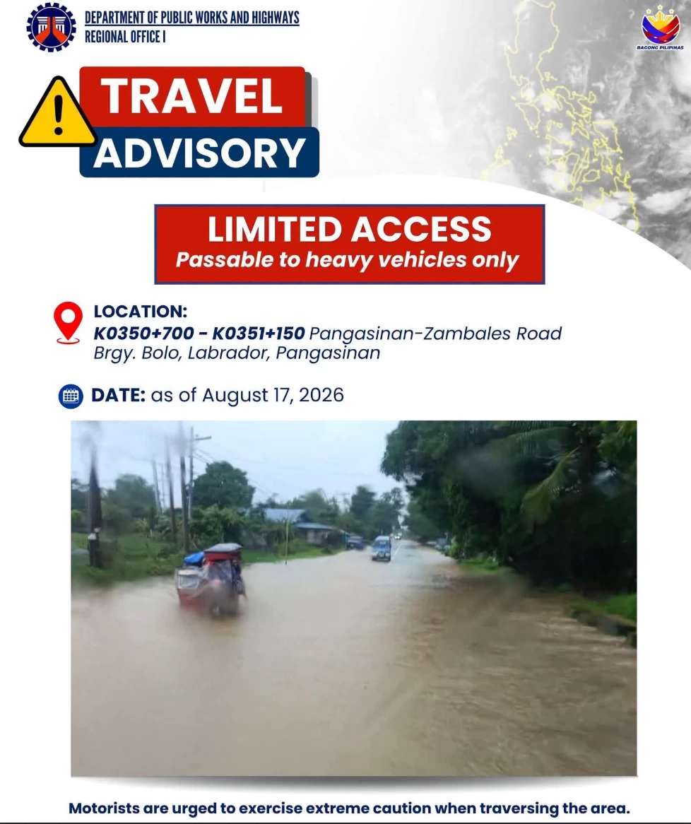 Floodwaters inundate a portion of the Pangasinan-Zambales Road in Barangay Bolo, Labrador, Pangasinan, on Monday, August 17, 2026. The affected section has limited access and is currently passable only to heavy vehicles.(DPWH photo)
