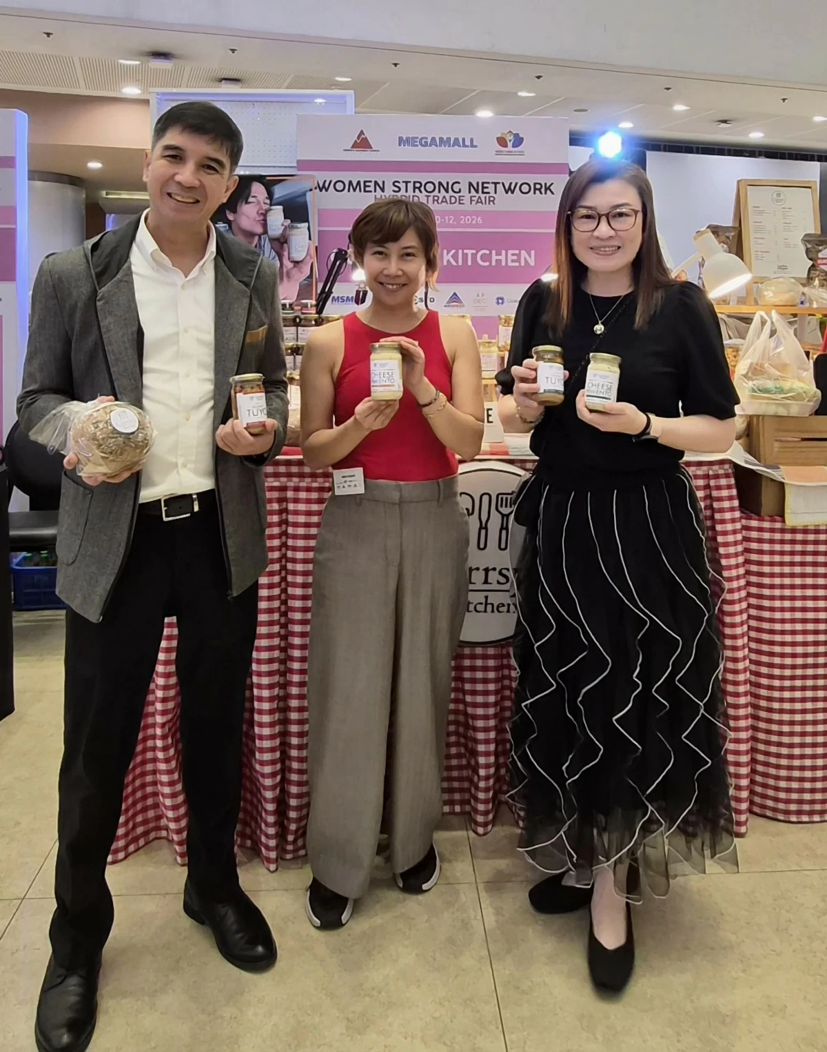 Royston Cabunag with the women of Corrsy’s Kitchen 