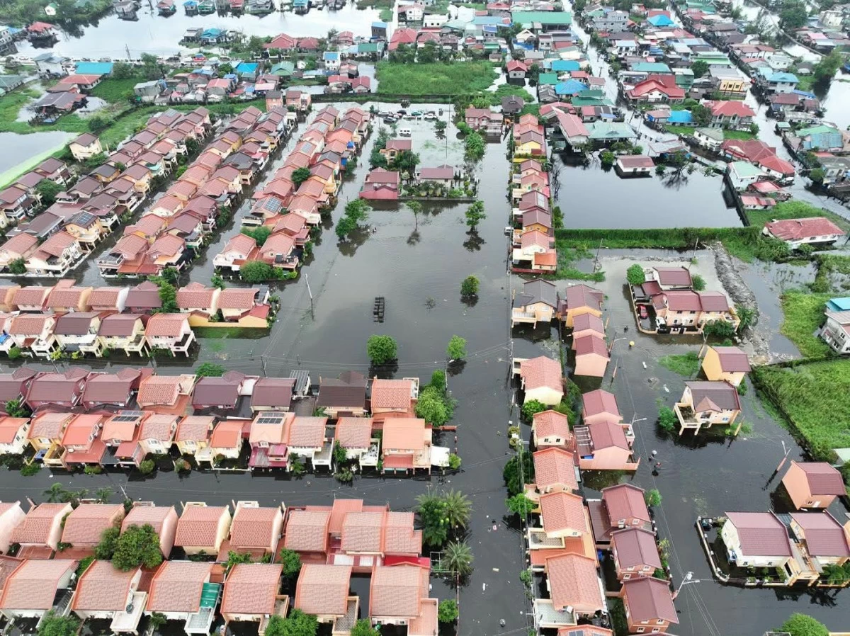 An aerial view shows the extent of flooding in Camella Subdivision in Apalit, Pampanga, as local disaster response teams continue to monitor the situation and provide updates. (Photo courtesy of MDRRMO Apalit) 