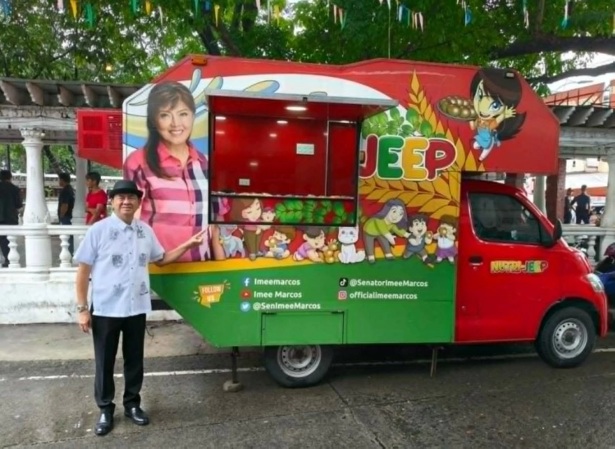 Angono Mayor Gerardo Calderon beside the Nutri-Jeep (Photo by Angono Tourism Office)