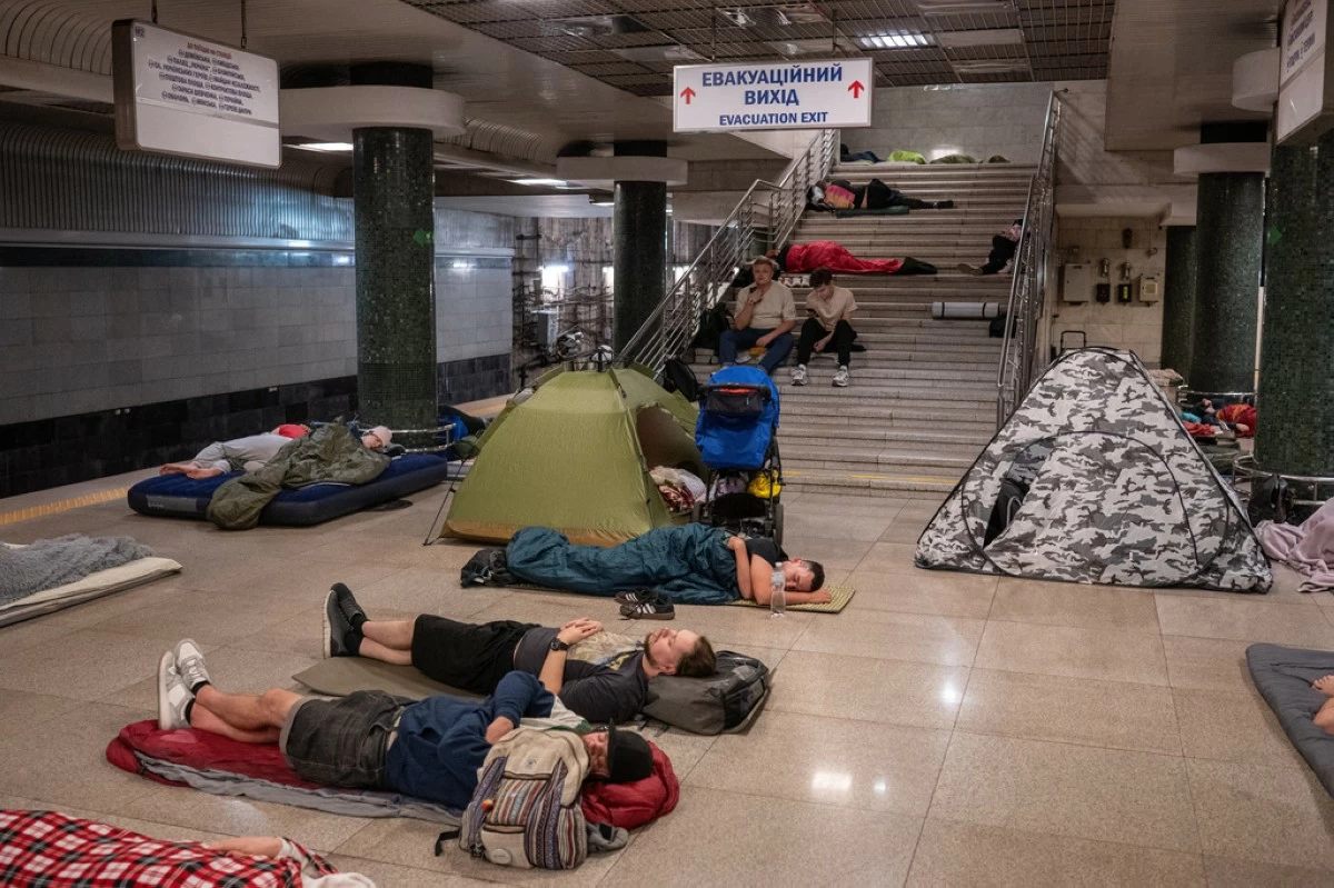 People take shelter in a metro station during a night Russian attack, in Kyiv, Ukraine, early Thursday, Aug. 20, 2026.  (AP Photo/Danylo Antoniuk) CORRECTION: photographer's name corrected to Danylo Antoniuk instead of Dan Bashakov