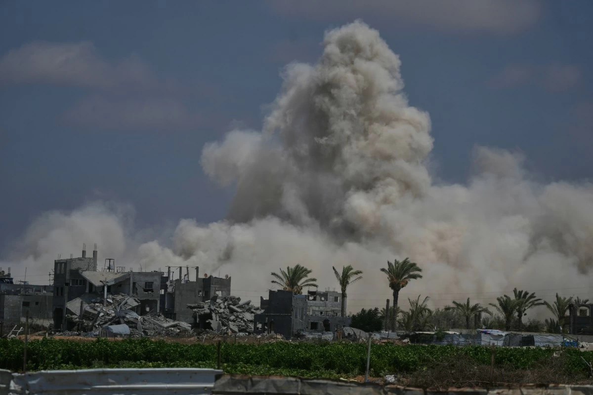 The Israeli army demolishes buildings east of Deir al-Balah, central Gaza Strip, Saturday Aug. 22, 2026. (AP Photo/Abdel Kareem Hana)
