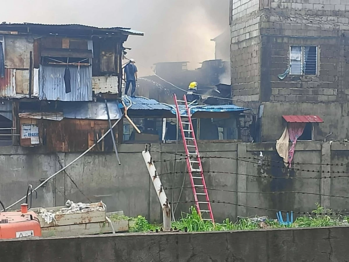 The fire in Bunyi Compound on East Service Road, Barangay Cupang, Muntinlupa on Aug. 22 (Photo from Sucat BDRRM Responders)