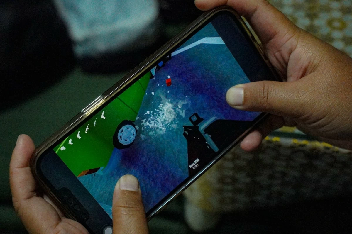 A mobile device displays the interface of the video game GoreBox on June 25, 2026. The Cybercrime Investigation and Coordinating Center (CICC) imposed a temporary ban on the physics-driven sandbox game after police investigators found that a 14-year-old Grade 9 student involved in a fatal school shooting in Tacloban City was a frequent player prior to the incident. (John Louie Abrina)