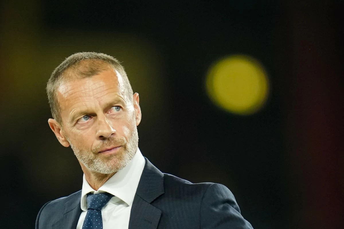 UEFA President Aleksander Ceferin looks on during the trophy ceremony at the end of the UEFA Super Cup soccer match between Paris Saint-Germain and Aston Villa in Salzburg, Austria, Wednesday, Aug.12, 2026. (AP Photo/Darko Bandic)