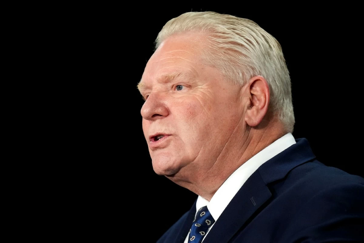Ontario Premier Doug Ford speaks to the media regarding the federal governments decision to allow Chinese EV's into Canada at Queen's Park in Toronto on Wednesday, Jan. 21, 2026. (Nathan Denette/The Canadian Press via AP/File)