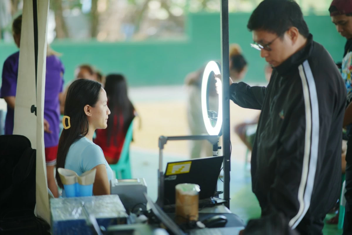 Danielle has her photo taken as part of her National ID registration, a step that will allow her to access digital financial services and new opportunities in the digital economy.