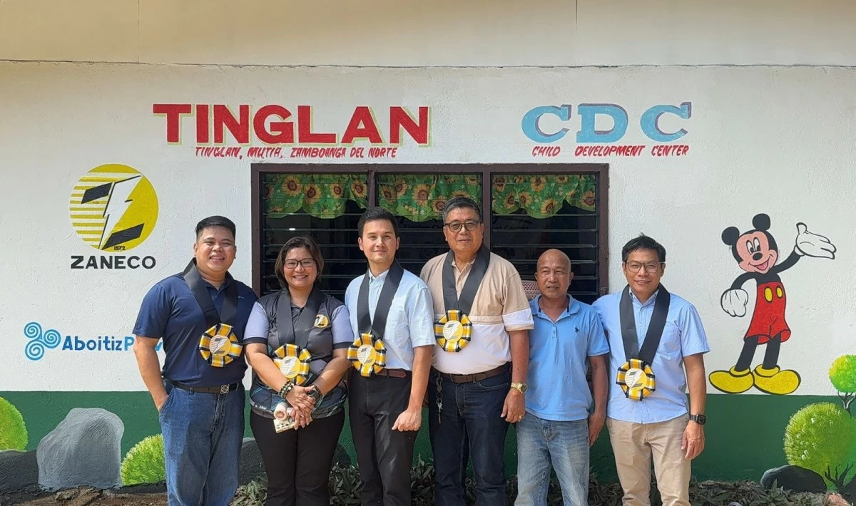 Adopt-a-Daycare Program for Tinglan Child Development Center. AboitizPower and ZANECO, led by AboitizPower Head of Revenue Operations ,James Yu (third from left) and ZANECO General Manager Atty. Jordanne Chan-Antonio (second from left), turn over the renovated daycare facility to local community representatives. 