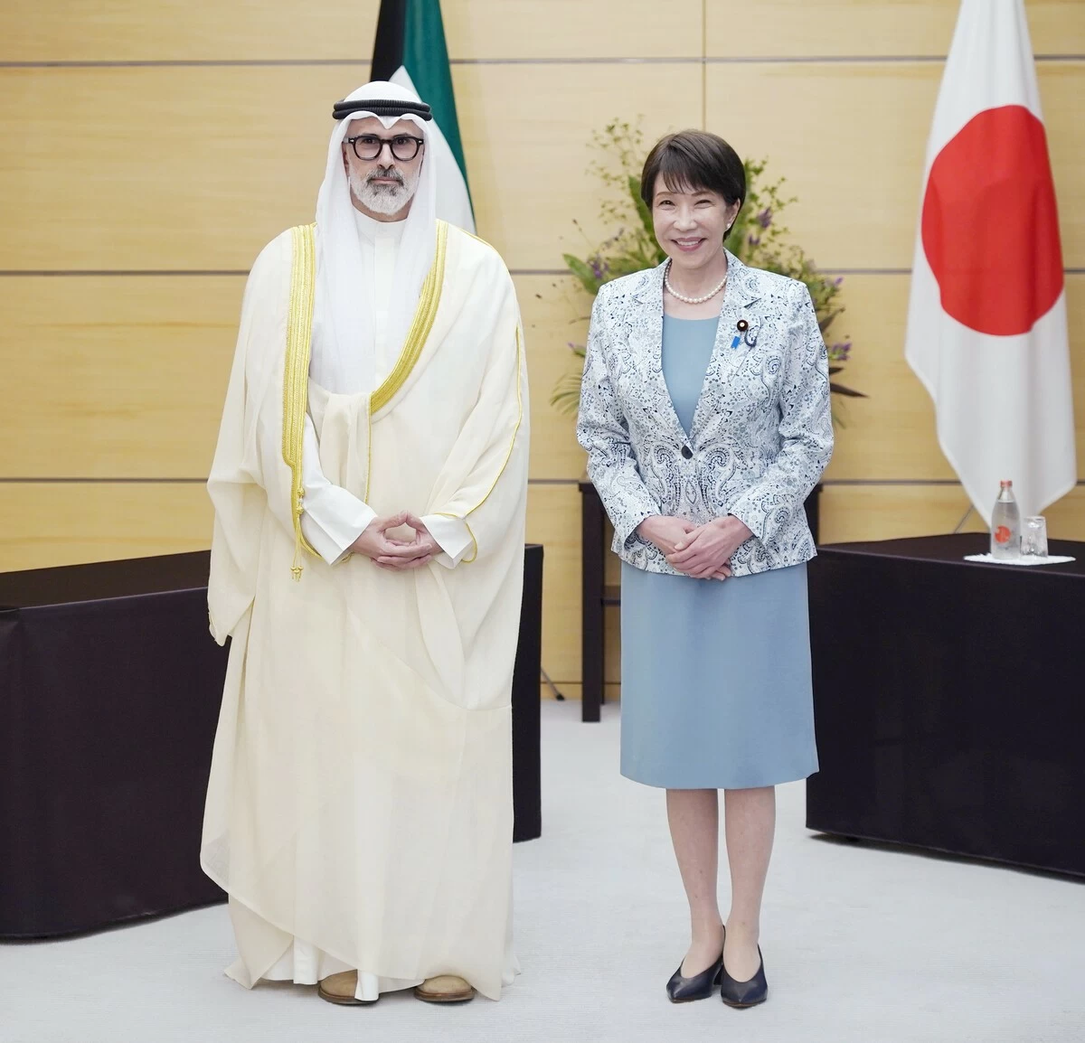 Kuwaiti Foreign Minister Sheikh Jarrah Jaber Al-Ahmad Al-Sabah (left) pays a courtesy call on Japanese Prime Minister Sanae Takaichi at the prime minister's office in Tokyo on Wednesday, August 26.