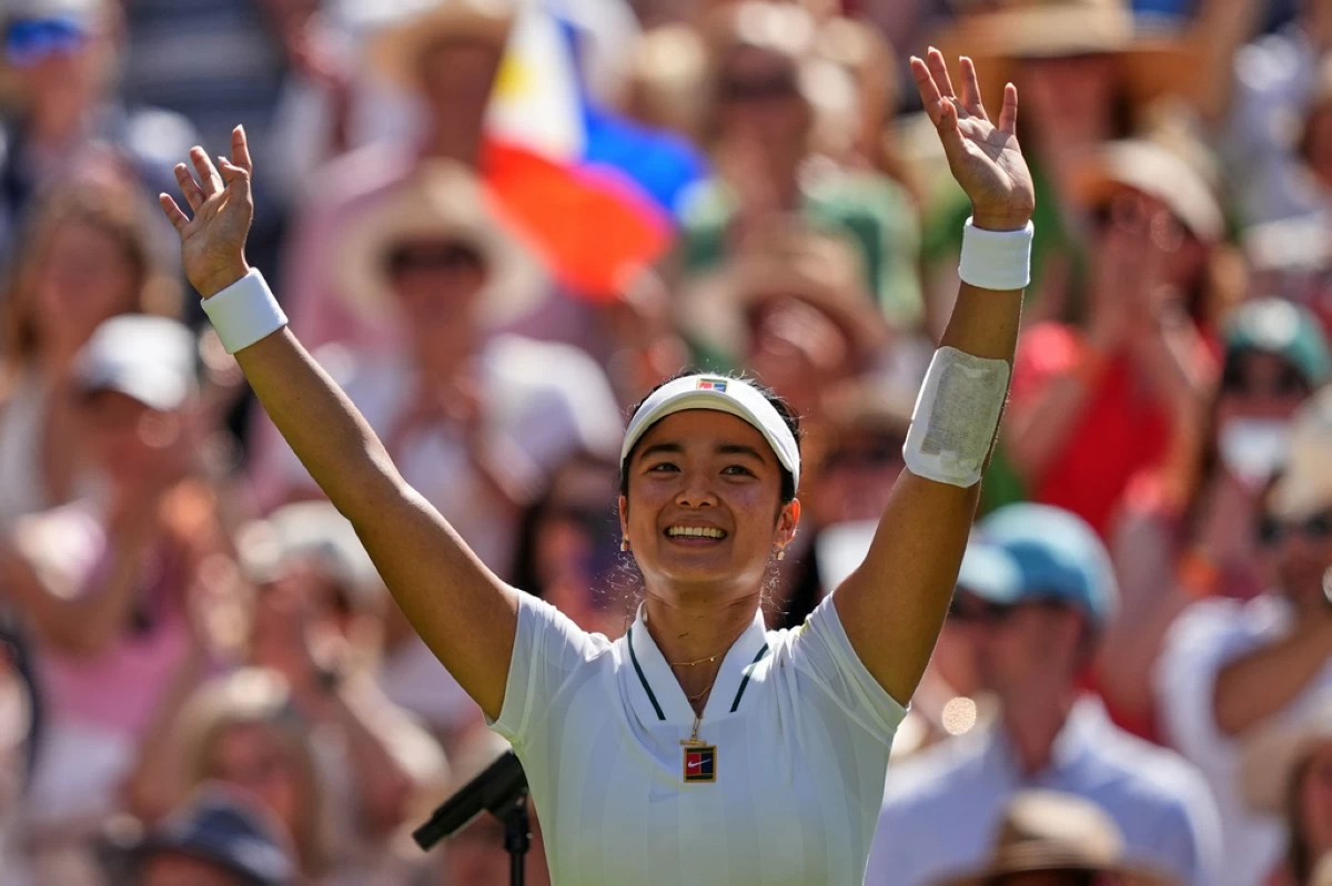 FILE PHOTO -- Alexandra Eala of the Philippines celebrates winning the third round women's singles match against Iga Swiatek of Poland at the Wimbledon Tennis Championships in London, Saturday, July 4, 2026.(AP Photo/Maja Smiejkowska)