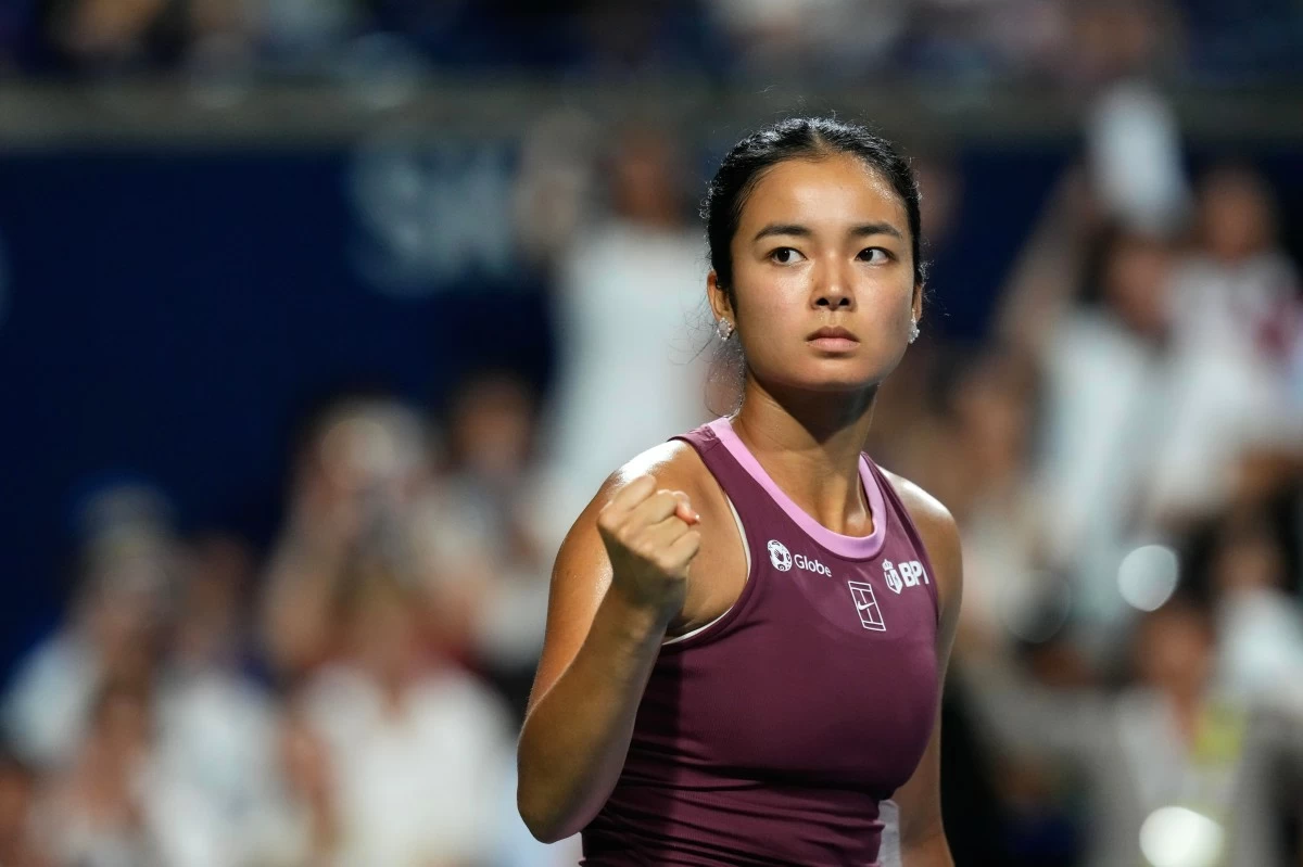 Philippines' Alexandra Eala celebrates a point against United States' Caty McNally during a National Bank Open tennis match in Toronto on Friday, Aug. 7, 2026. (Chris Young/The Canadian Press via AP)