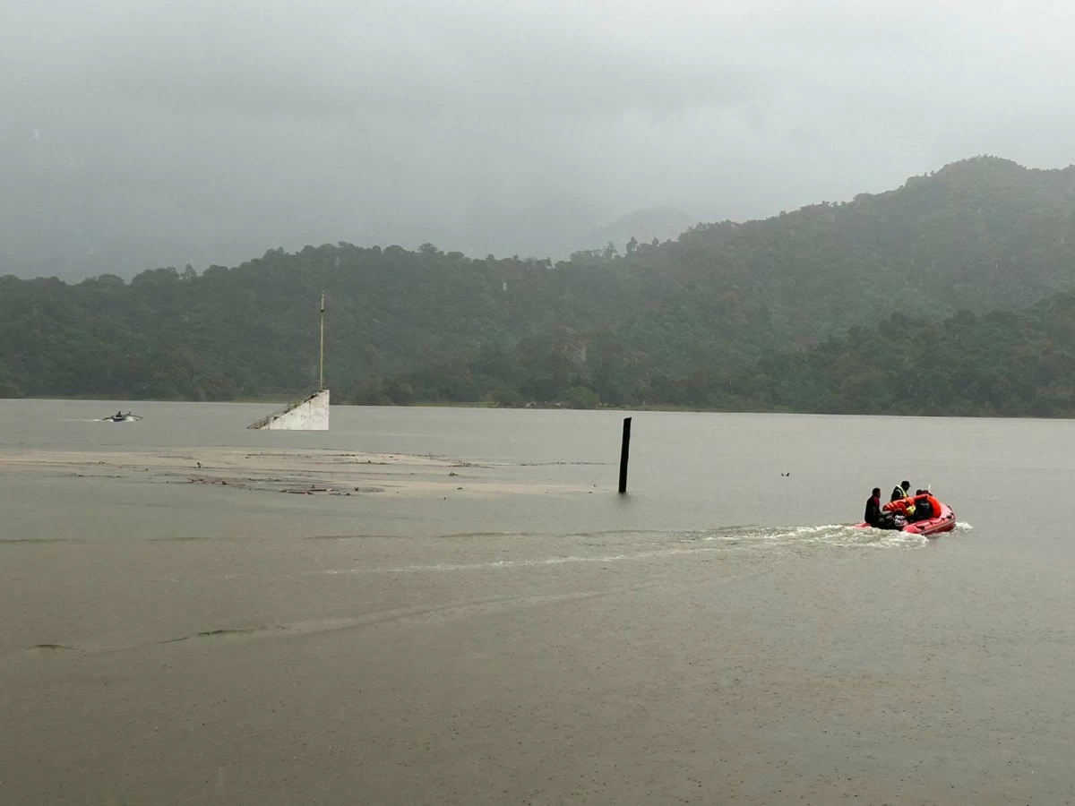 Philippine Coast Guard (PCG) personnel conduct search and rescue operations for three missing Aeta passengers after a boat capsized off Mapanuepe Lake in San Marcelino, Zambales on Aug. 27, 2026, killing six people while four others were rescued. (Photo: PCG)
