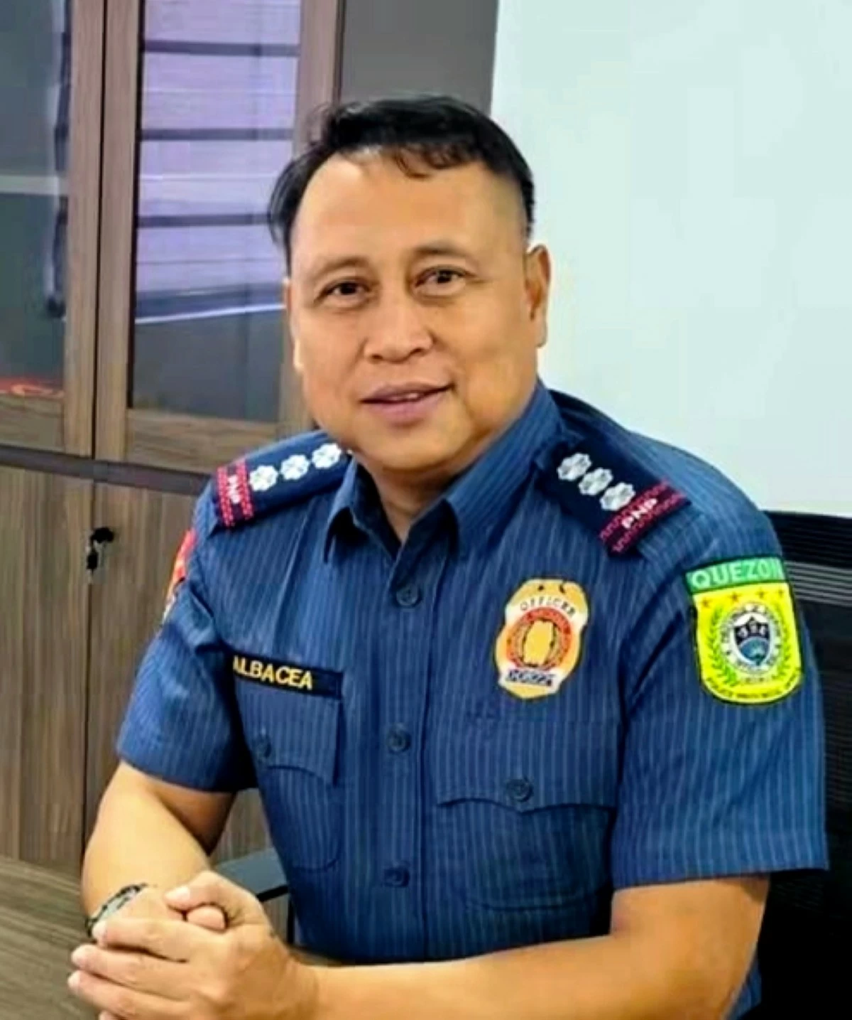 
Police Col. Romulo Albacea, Quezon police director, interviewed with the media on police assistance to public schools in Quezon. (Danny Estacio)