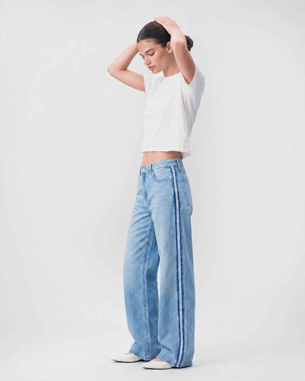 Side-Striped Wide-Leg Jeans styled with a Cotton Knit Baby Tee