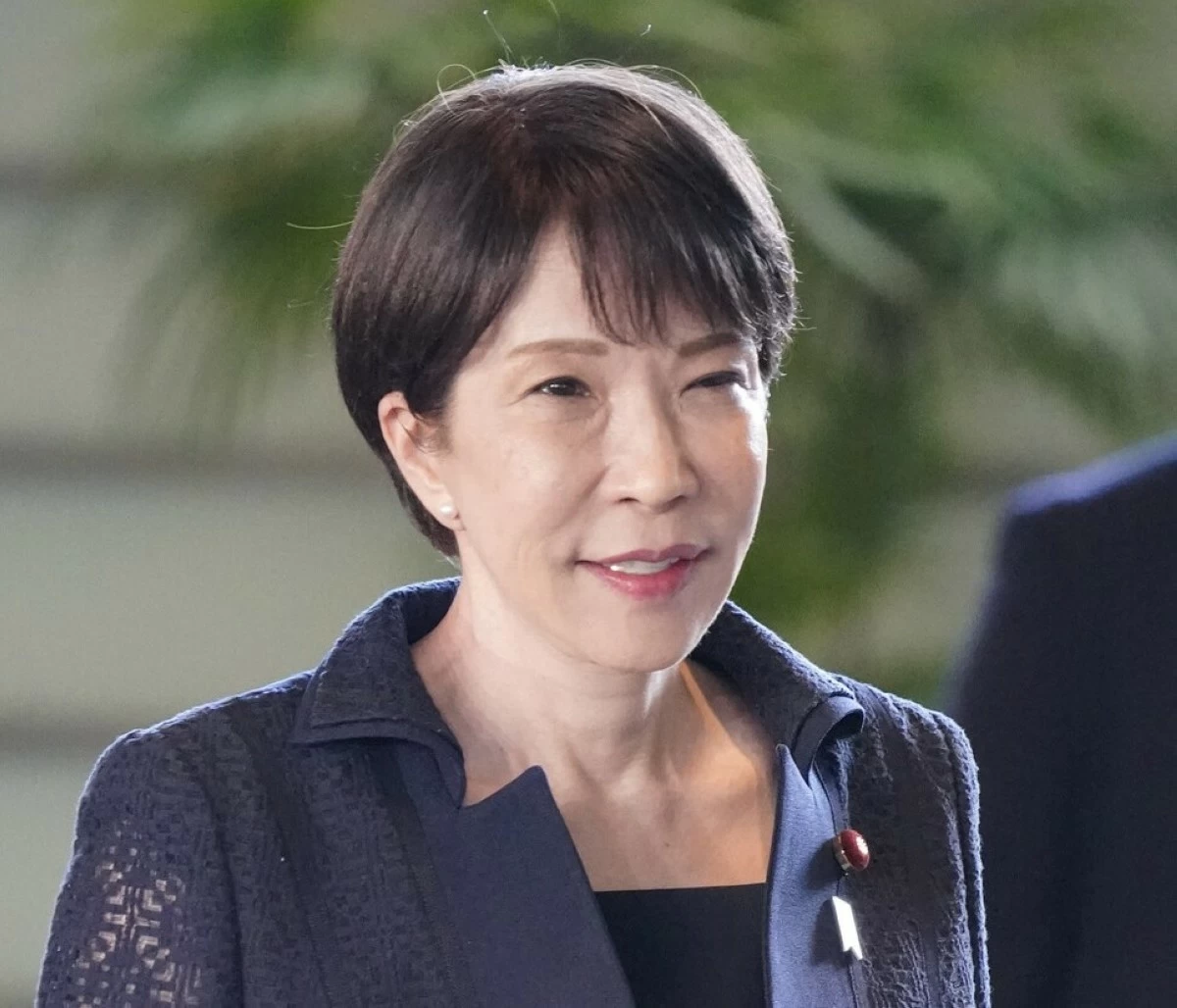Japanese Prime Minister Sanae Takaichi enters the prime minister's office in Tokyo on Friday, Aug. 28.