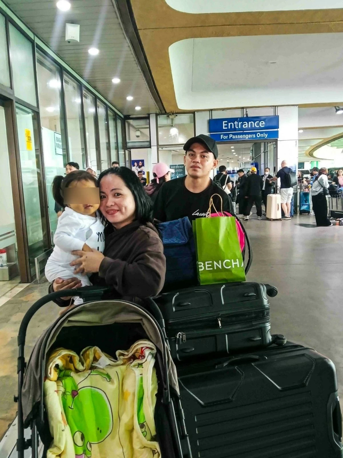 Baby Ayla and her parents at the airport departure area before their flight to India. (Photo from Valenzuela LGU)