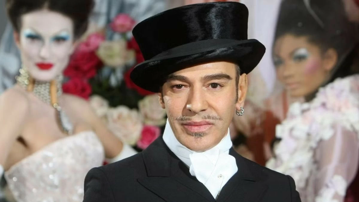 Fashion designer John Galliano poses at the end of the presentation of the Dior Haute Couture spring/summer 2010 fashion collection on Jan. 25, 2010, in Paris. (AP Photo/Jacques Brinon, File)