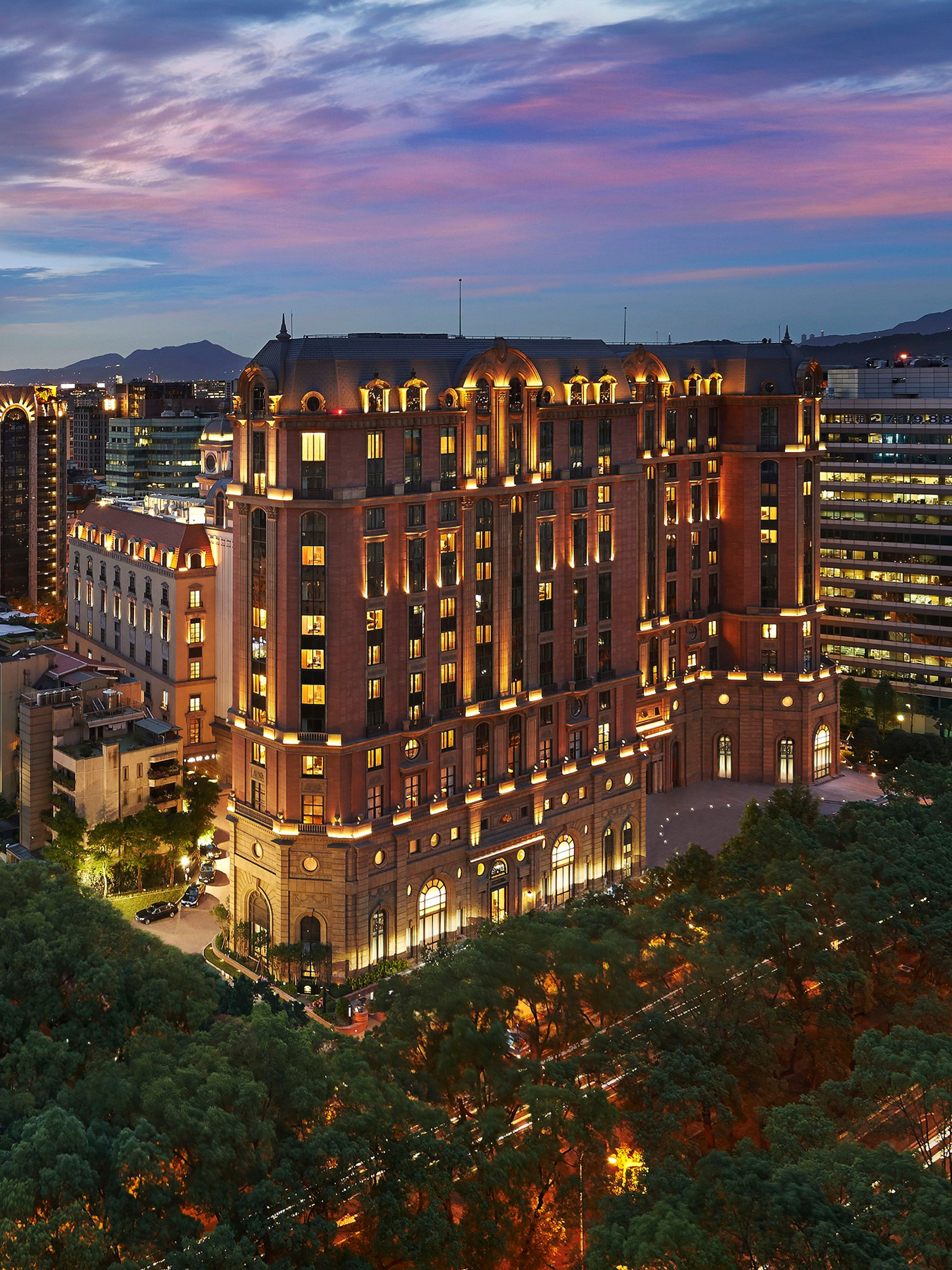 1 The European architecture-inspired edifice of Mandarin Oriental, Taipei rises above the verdant tree-lined avenue of Dunhua North Road in the Shongshan District.jpg