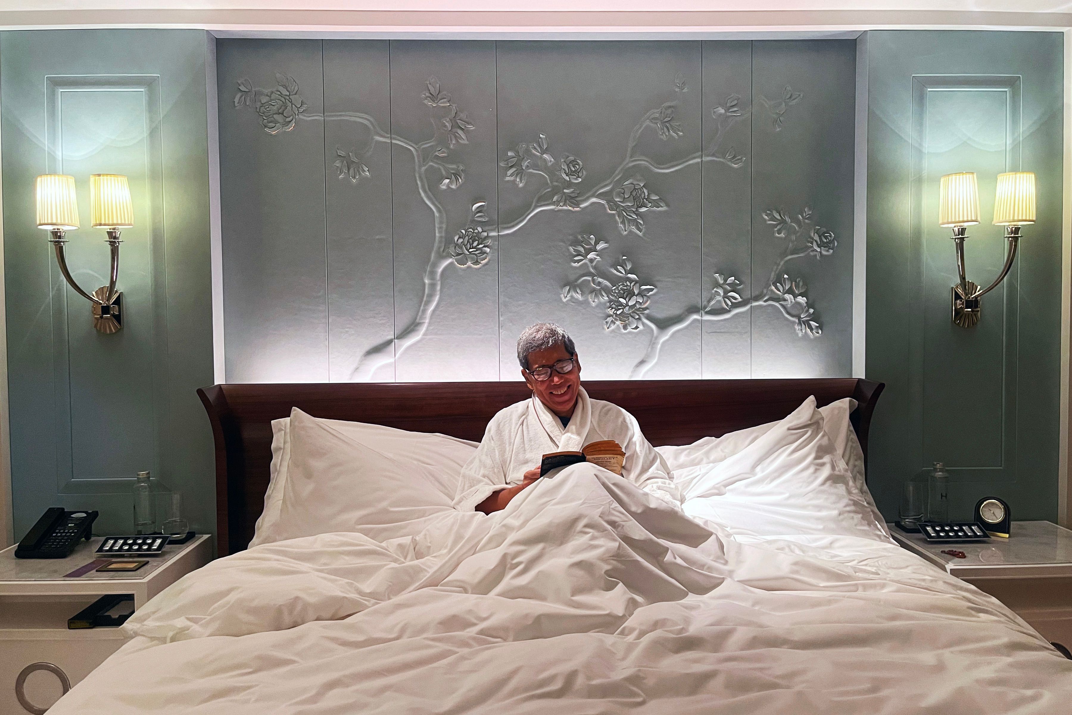 4 The elegant suite's piece de resistance— English artist Amy Murray’s hand-sculpted Peonies on wall panels of fine leather.jpg