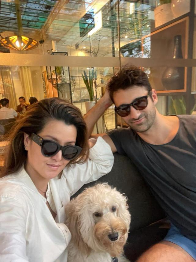 BRUNCHTIME With her schnoodle Malthe and her bestfriend, Argentinian consul Fabricio Sordoni.jpg