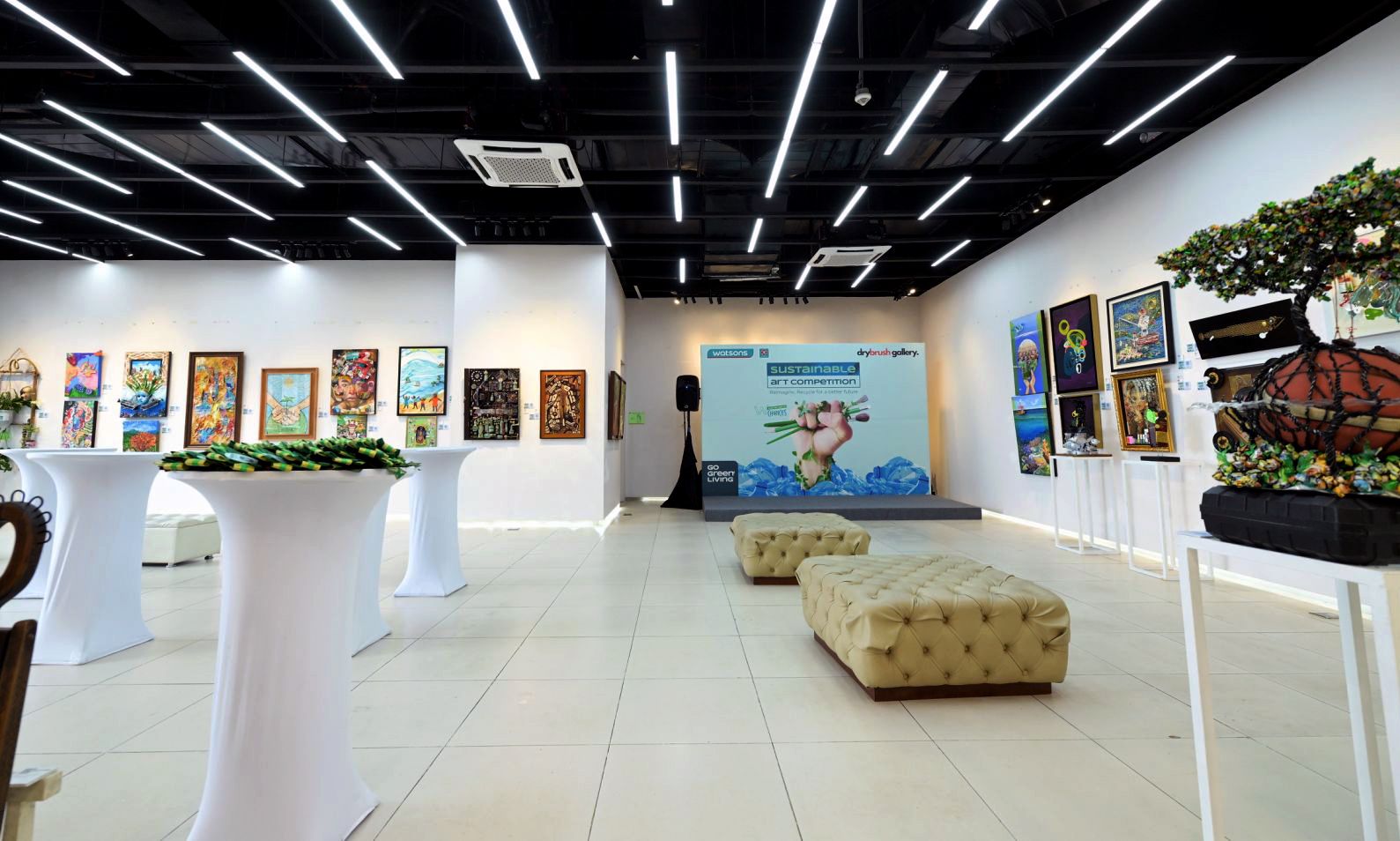 Drybrush Gallery exhibit with artworks from the sustainable art competition.jpg