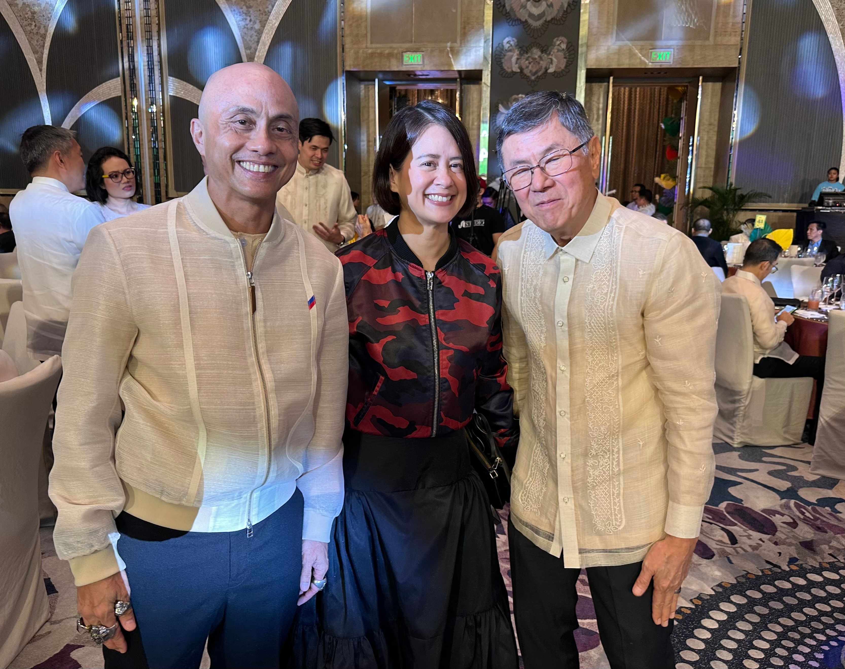 Ernie and Michelle Lopez with William Belo.jpeg