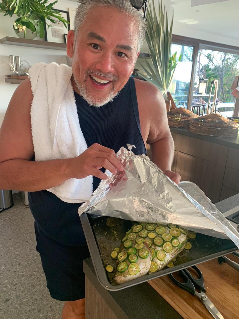 FRESH CATCH Rajo shows off fish bought fresh from a fisherman.jpg