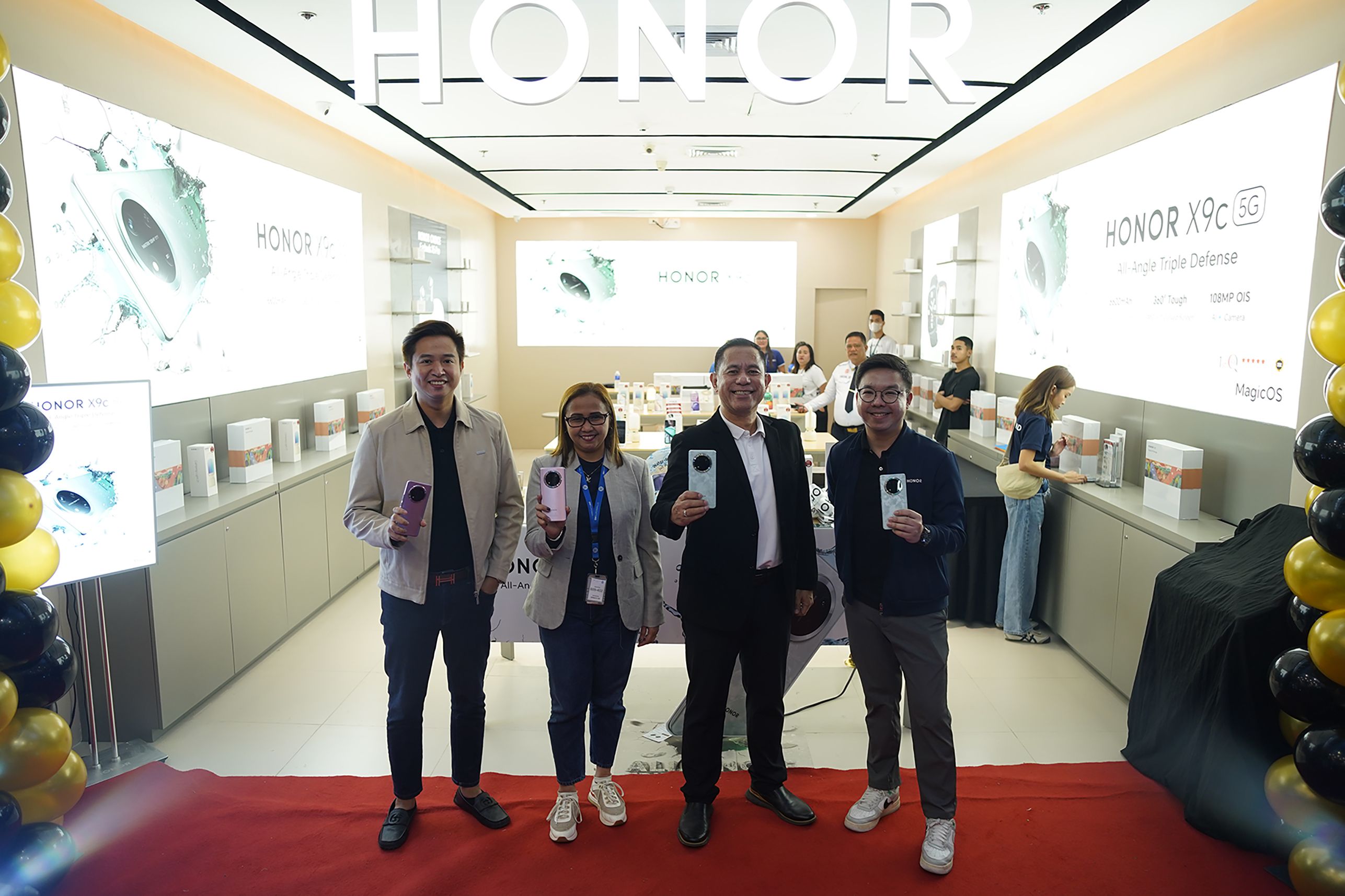 HONOR Philippines Vice President Stephen Cheng, _SM CDO Downtown Premier Mall Manager Ms. Lovelle A. See, Oro Gadget Incorporated’s Special Assistant to the President Allan Anthony Acosta Ramos, and PR Manager Pao O.JPG