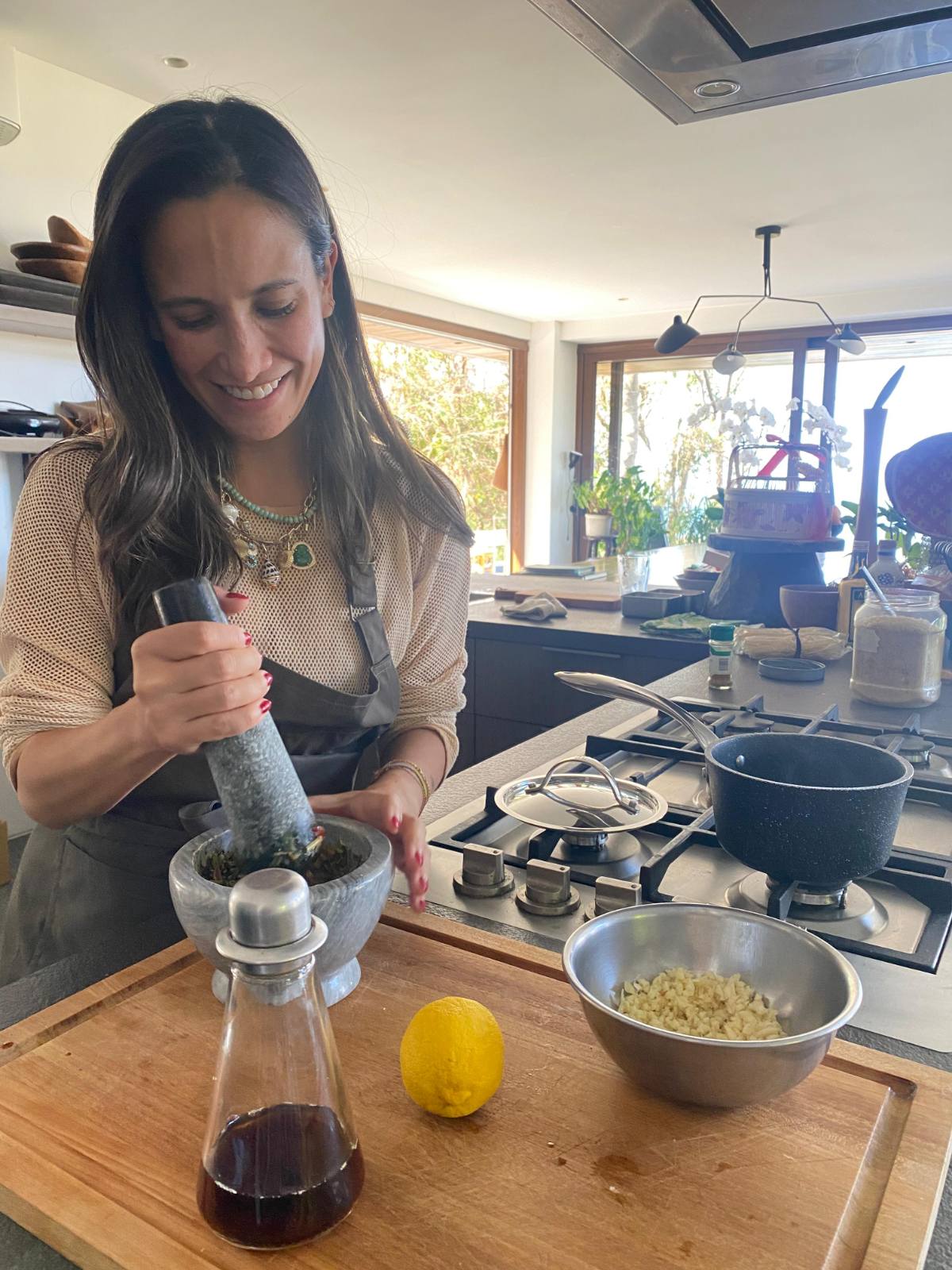 HOUSEGUEST IN THE KITCHEN Rajo's friend Stephanie Zubiri helps prepare a Sunday lunch.jpg