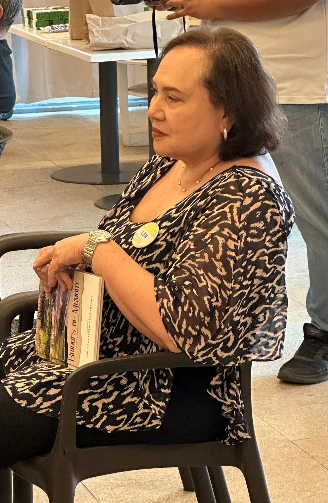 IN CONTEMPLATION Len Fernandez before reading her poem.jpeg