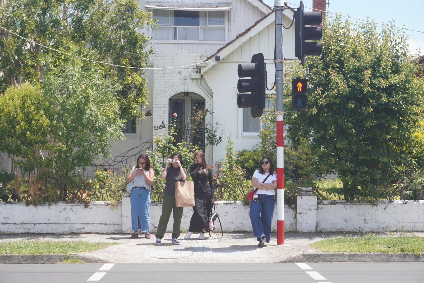 IN THE SUBURBS Old friends strolling the familiar sidewalks of Box Hill North.jpg