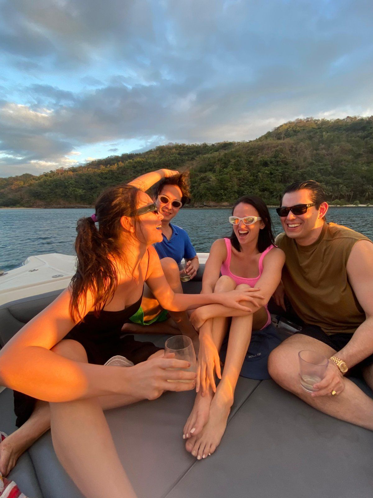ISLANDS IN THE SUN Jessica Wilson, Nix Alañon, Georgina Wilson, and Mond Gutierrez on a slow afternoon on the bay.jpg