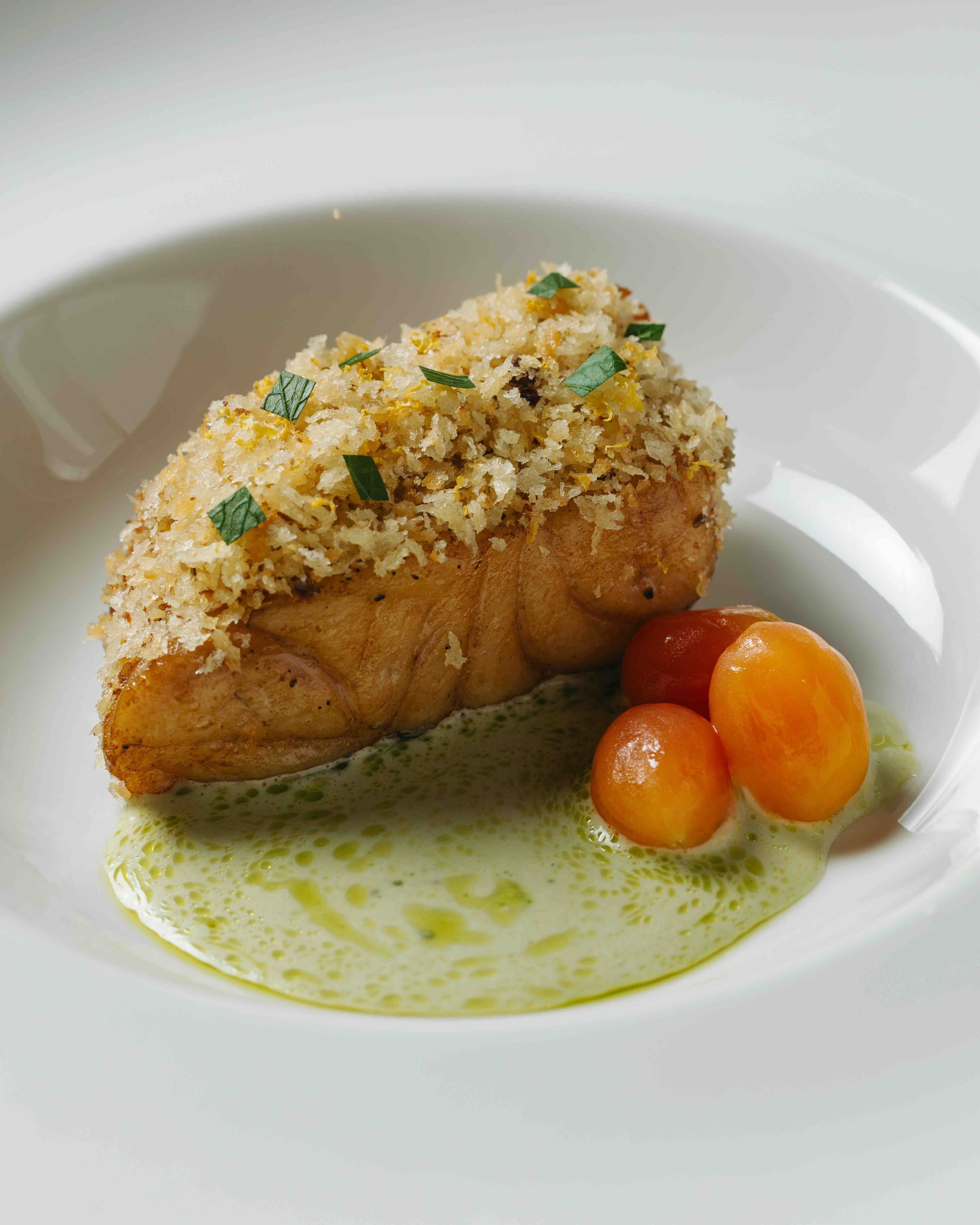 LAPU-LAPU Covered in tinapa bread crumbs with coconut-coriander velouté and candied tomatoes.jpeg