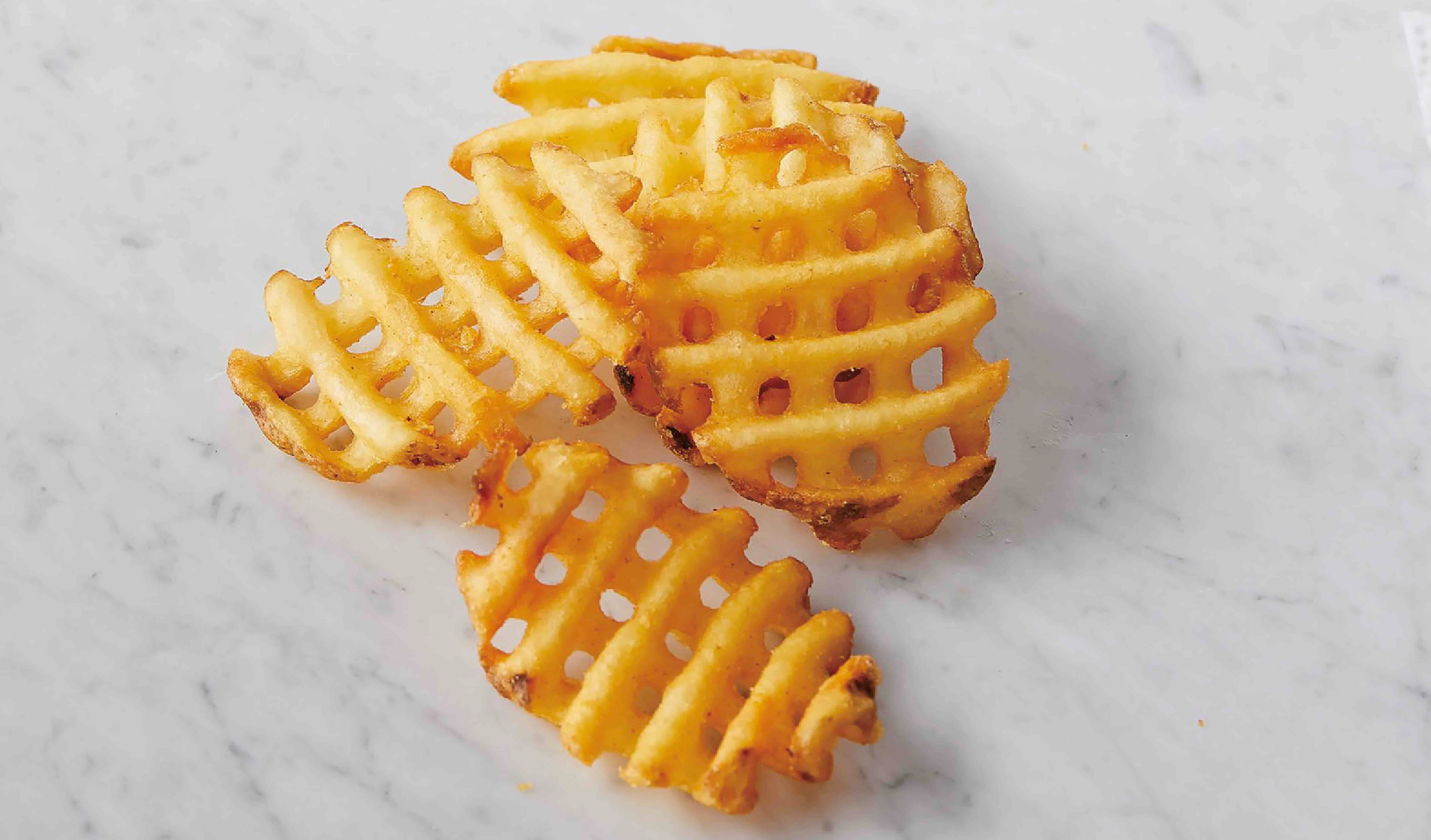 LATTICE or basket-weave cut, a deep-fried frozen potato, is one of the many ways to prepare the versatile spud..jpeg