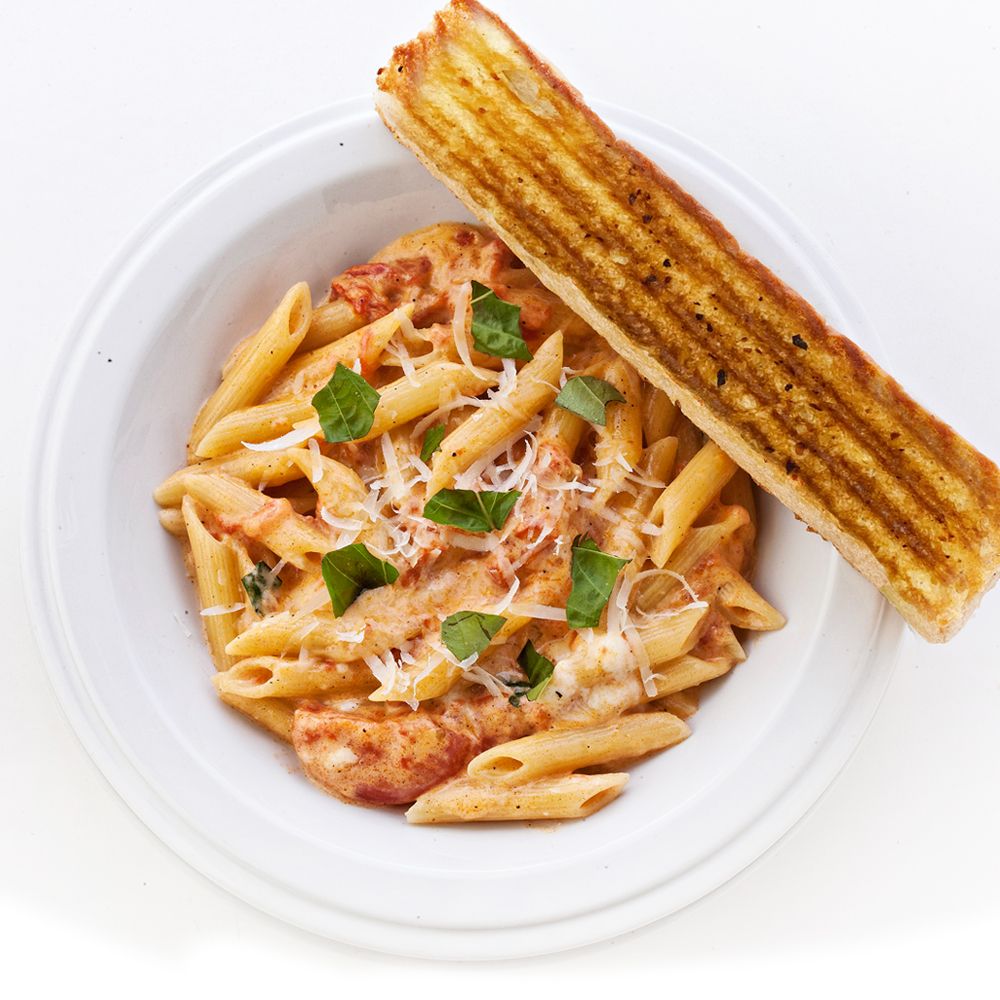 PENNE AL TELEFONO Mozzarella, white cheese, and basil.jpg