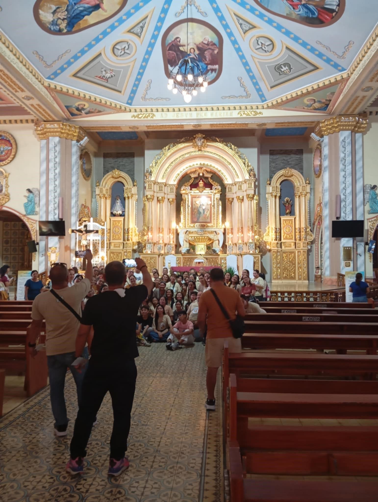 PEOPLE IN GROUPS INSIDE CHURCH IN CAINTA.jpg